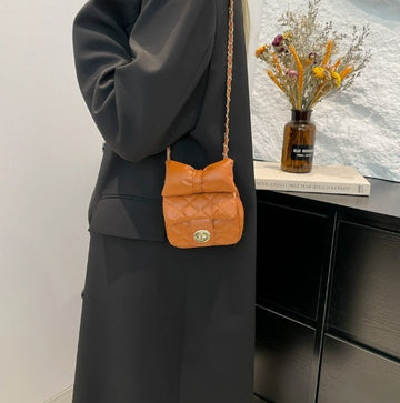 Mini Bow Quilted Crossbody Bag